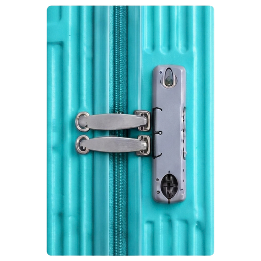 Close-up of a turquoise ribbed hard-shell suitcase with a silver zipper and a matching silver zipper pull, shown against a white background.