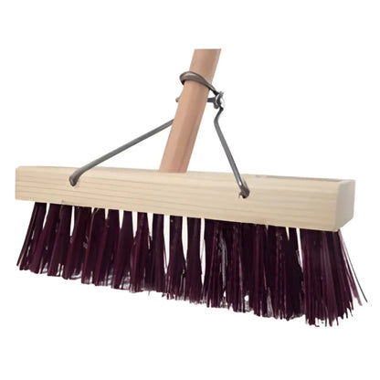 Durable heavy-duty hard cleaning broom for outdoor use.