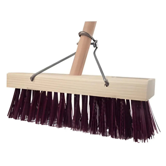 Durable heavy-duty hard cleaning broom for outdoor use.