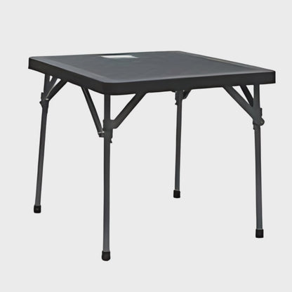 A compact folding table set up for four people.